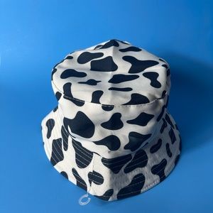 MOO" BUCKET HAT  Dye Cow Print. One size.